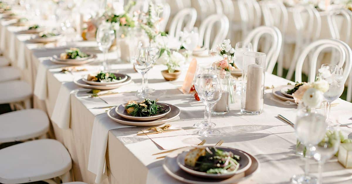Seasonal salad place settings prepared for an elegant event